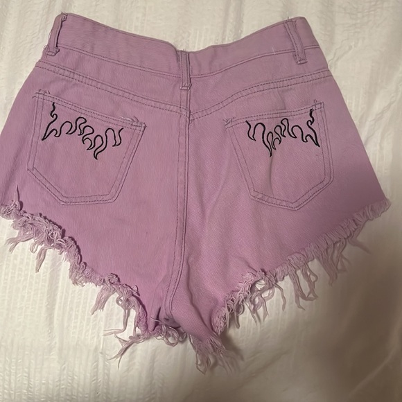 Purple shorts with black flames - Picture 2 of 2